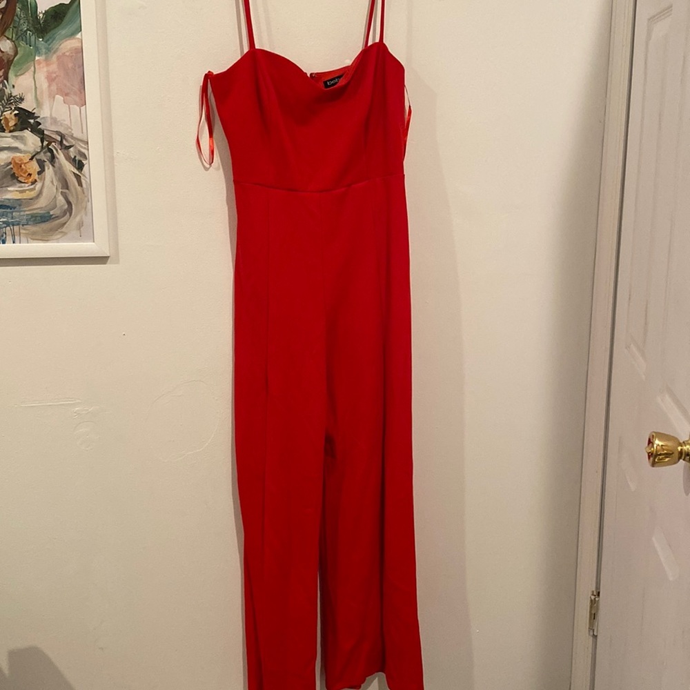 Red large BEBE jumpsuit never worn